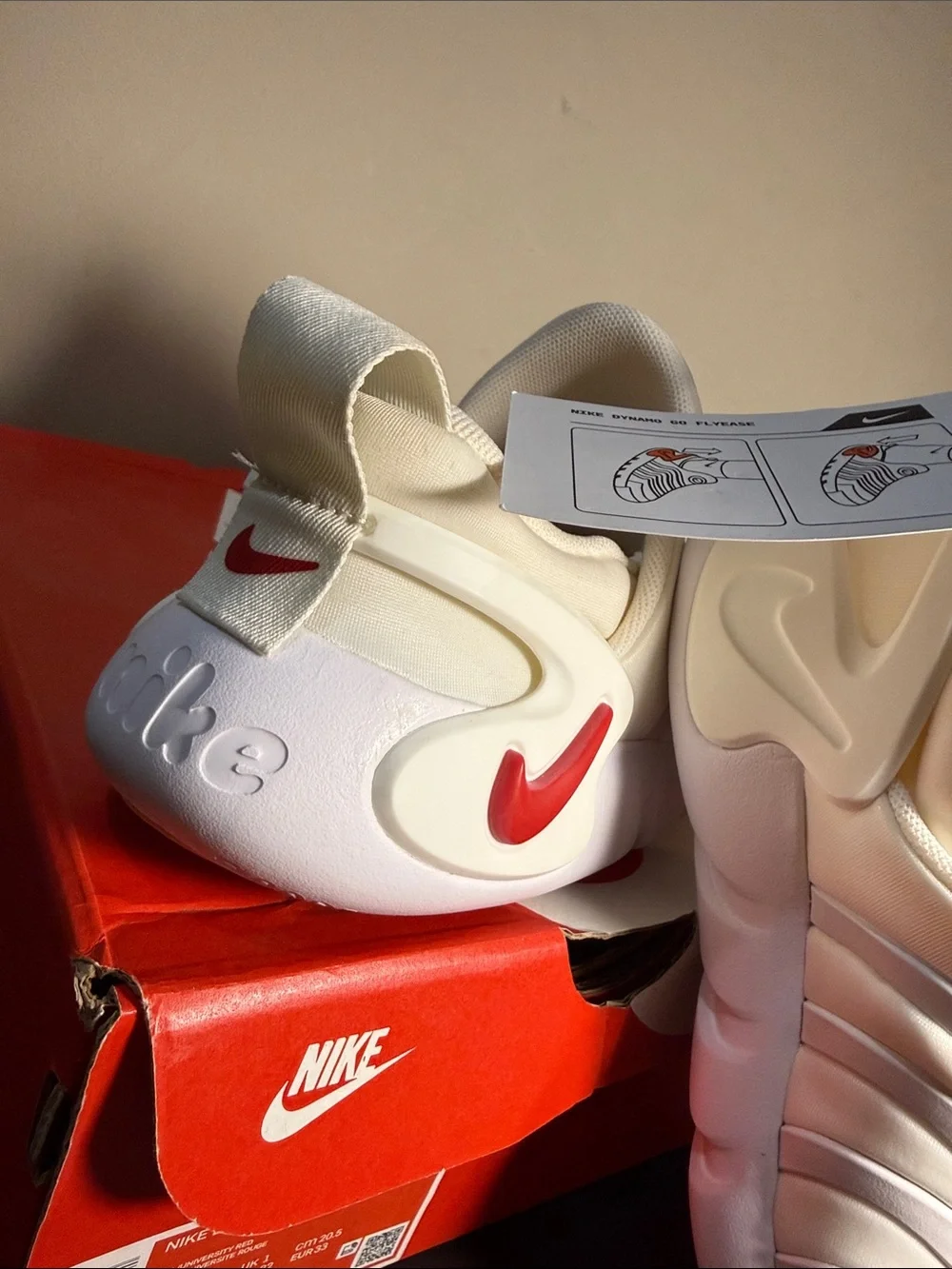 Nike Kids Slip-On Sneakers in Cream with Red Swoosh dumpling edition